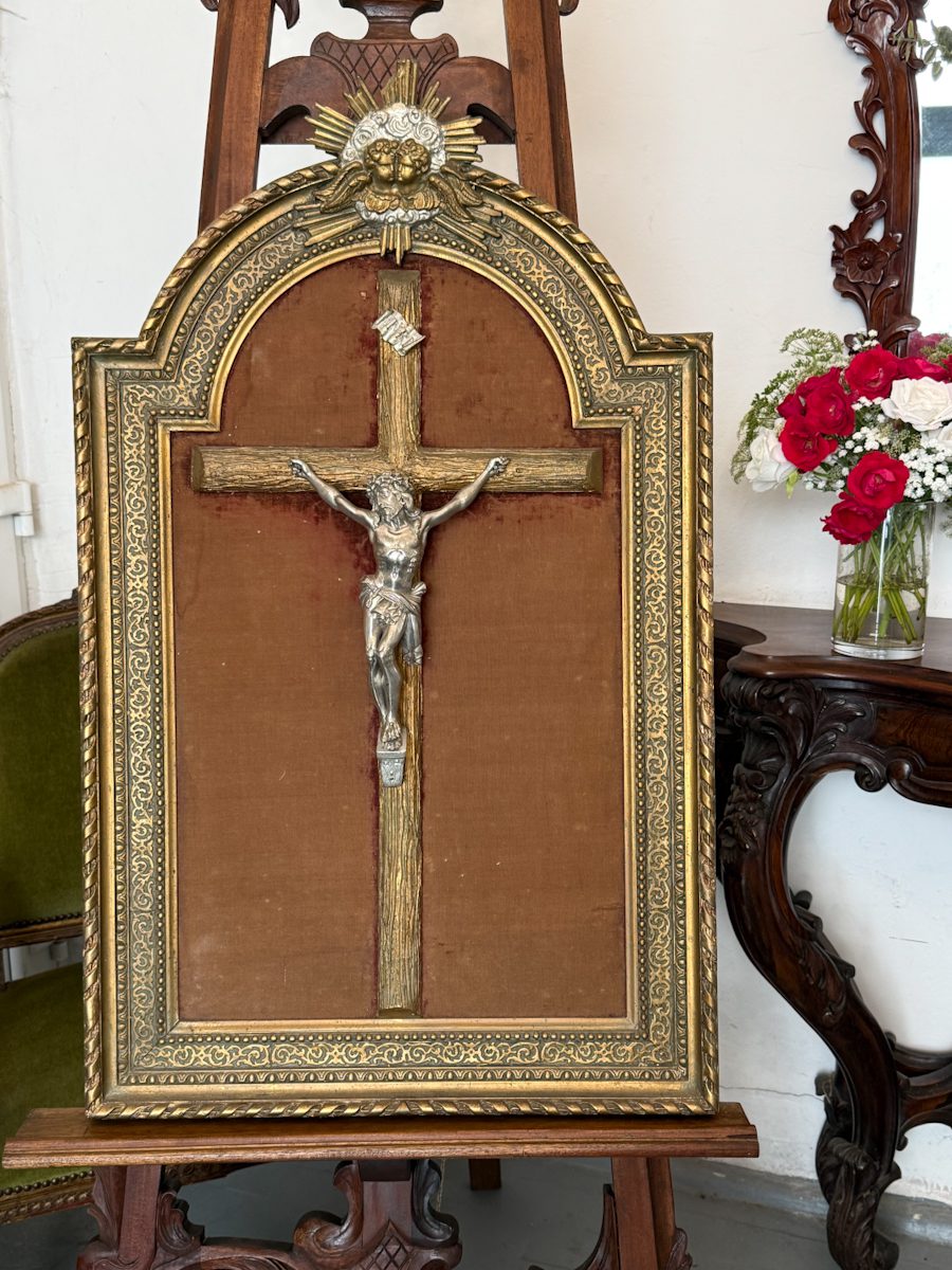 antique crucifix framed velvet cherubs