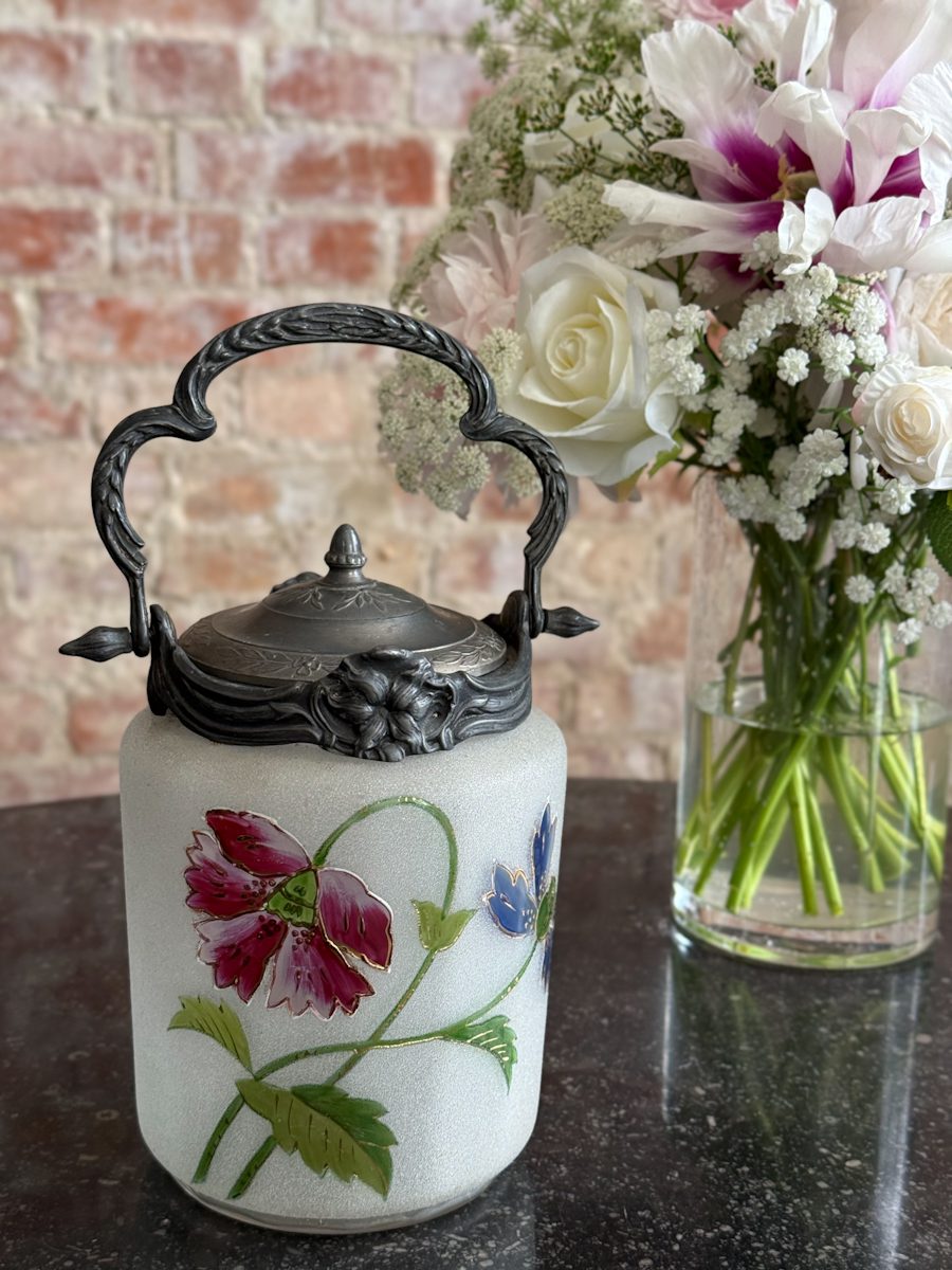 Antique hand-painted biscuit jar with floral motifs and metal lid