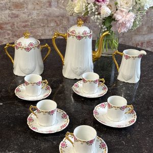 Limoges France porcelain coffee service with pink roses and gilt Art Deco border