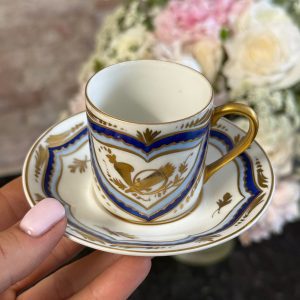 Antique Limoges porcelain coffee cup and saucer with cobalt blue borders and gold gilt motifs